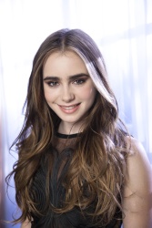Lily Collins - "Priest" press conference portraits by Armando Gallo (Beverly Hills, May 1, 2011) - 28xHQ N1IGR2a6